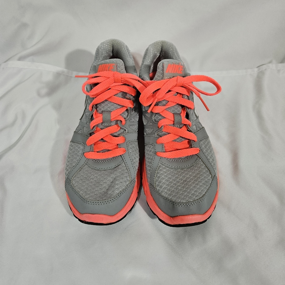 Nike neon pink and grey athletic shoes women's size 7.5
